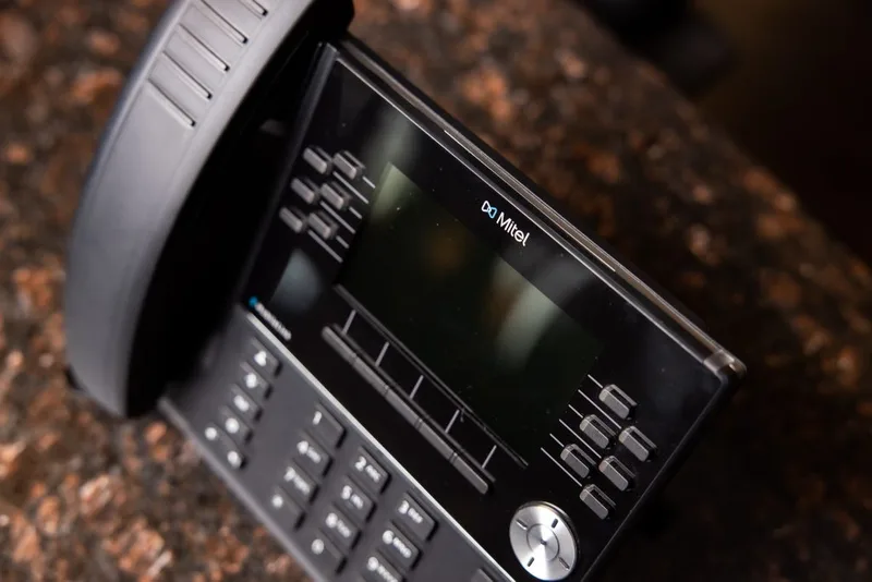 Mitel desk phone for an on-site business voice system.